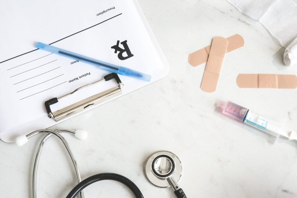Prescription pad and stethoscope on a doctor’s desk
